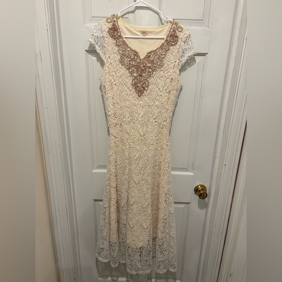 Reba Cream Lace Dress with Brown Detailing - Picture 1 of 5